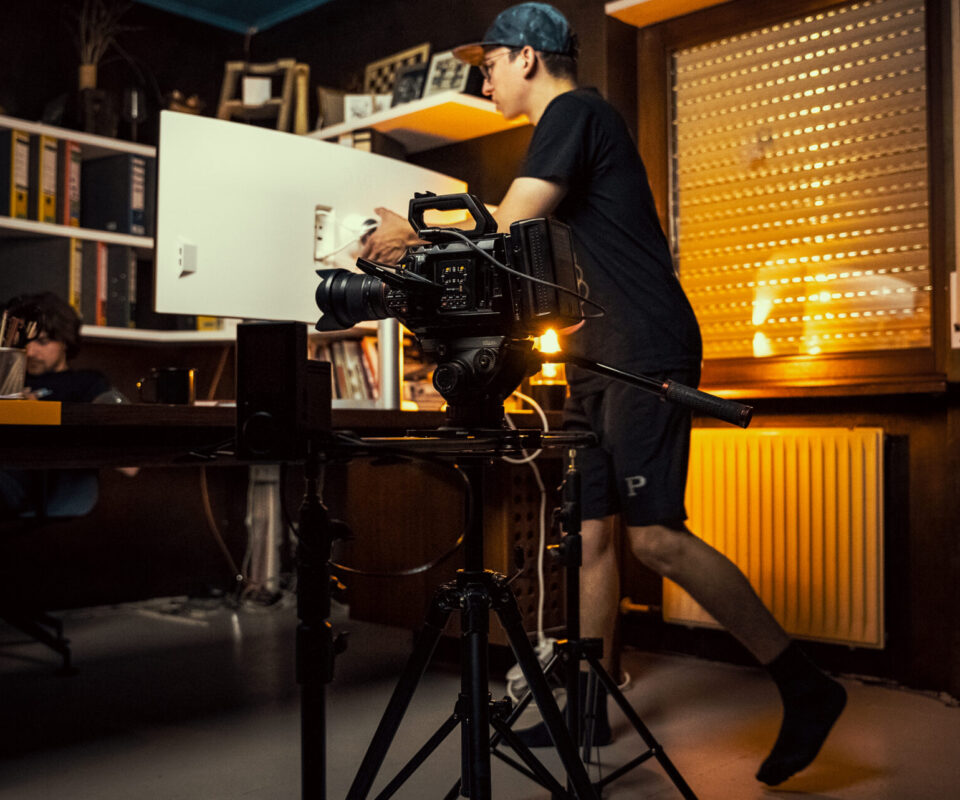 Sports film production cameraman sets up the scene Film production set setup in sports